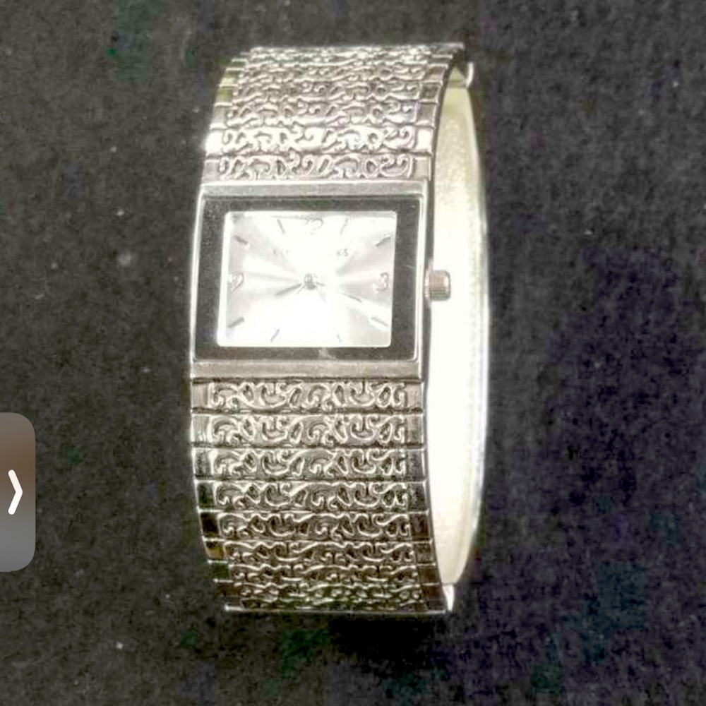 Silver tone watch